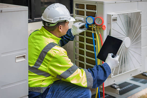 Professional Hvac technician working in Suburb Maryland Fac, MD